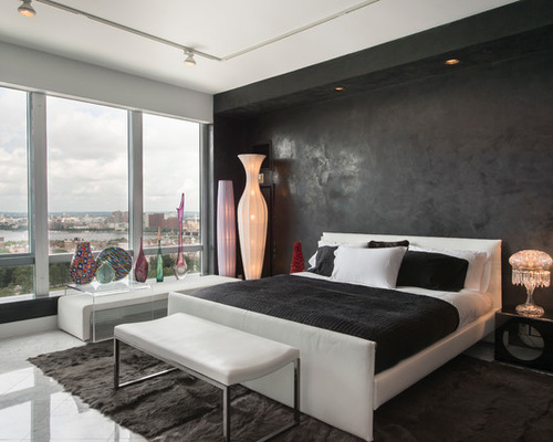 A bedroom decorated with pressed tin and modern decor.