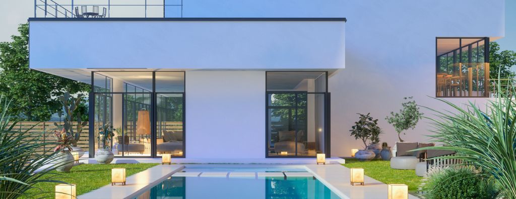 The exterior of a luxury modern home with a pool, large floor-to-ceiling glass windows, and a second-floor patio.