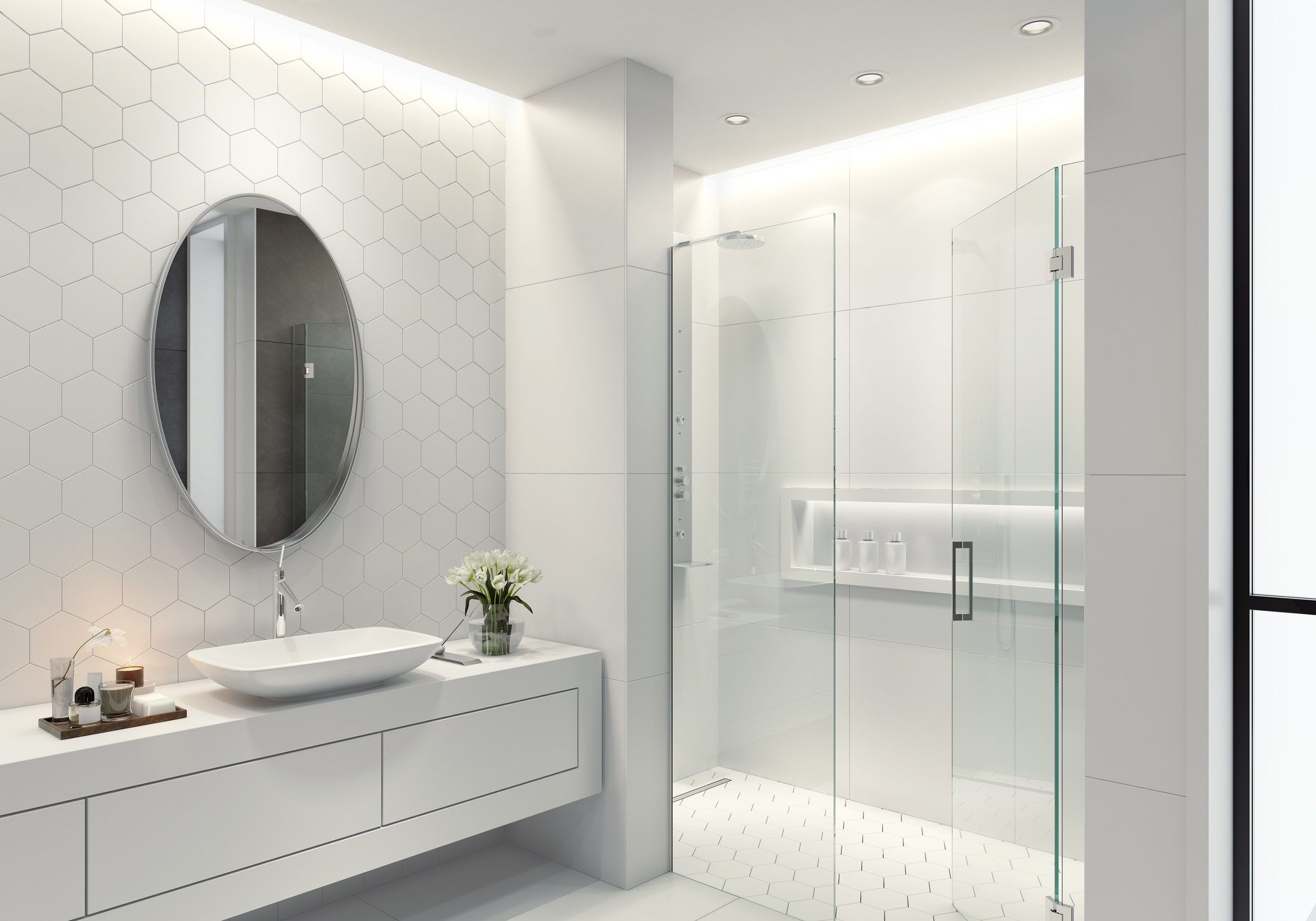 A bathroom with hexagon tile as the backsplash and shower floor. 