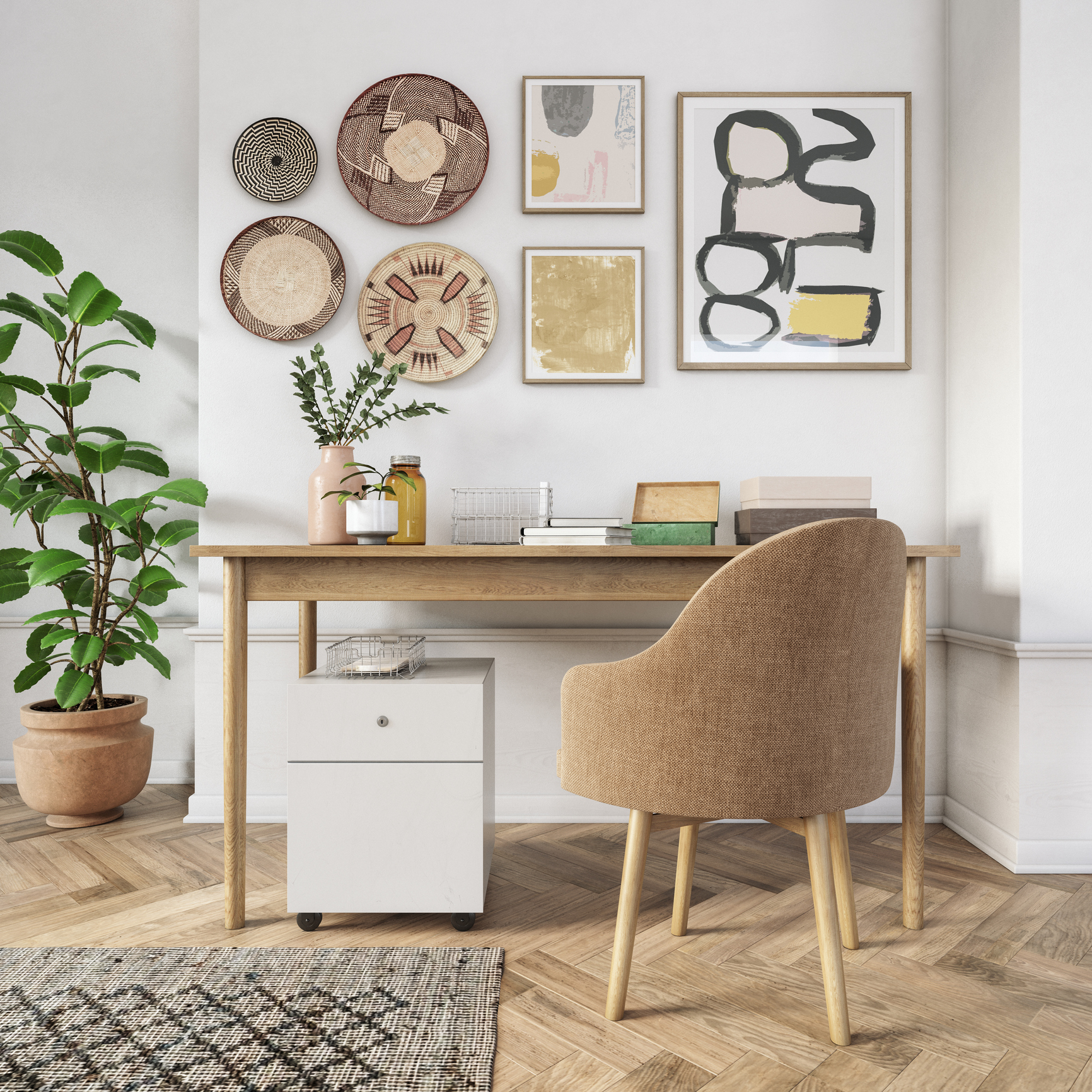 A home office with a gallery wall above the desk. 