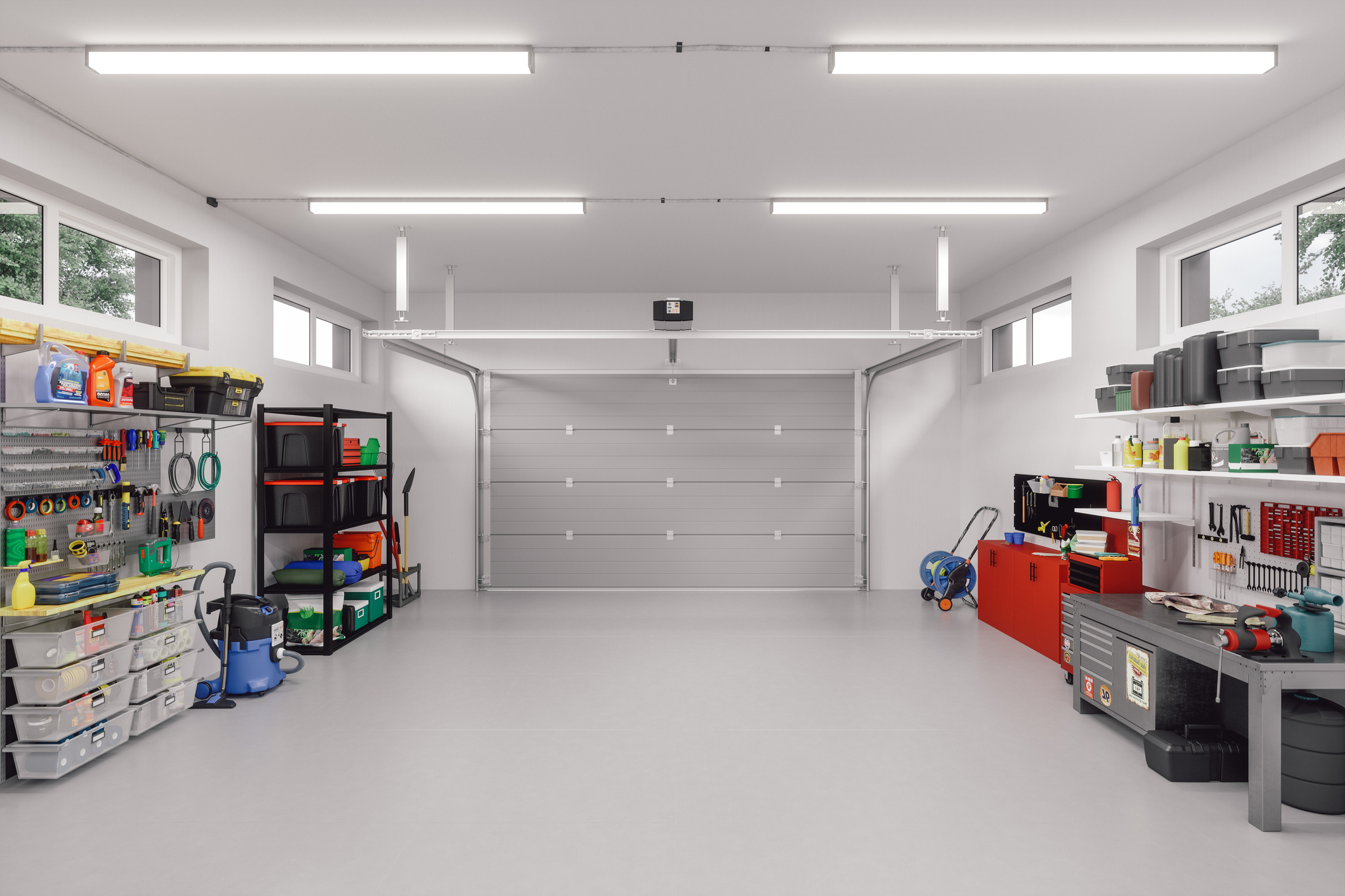 A very clean garage with bright overhead lights.