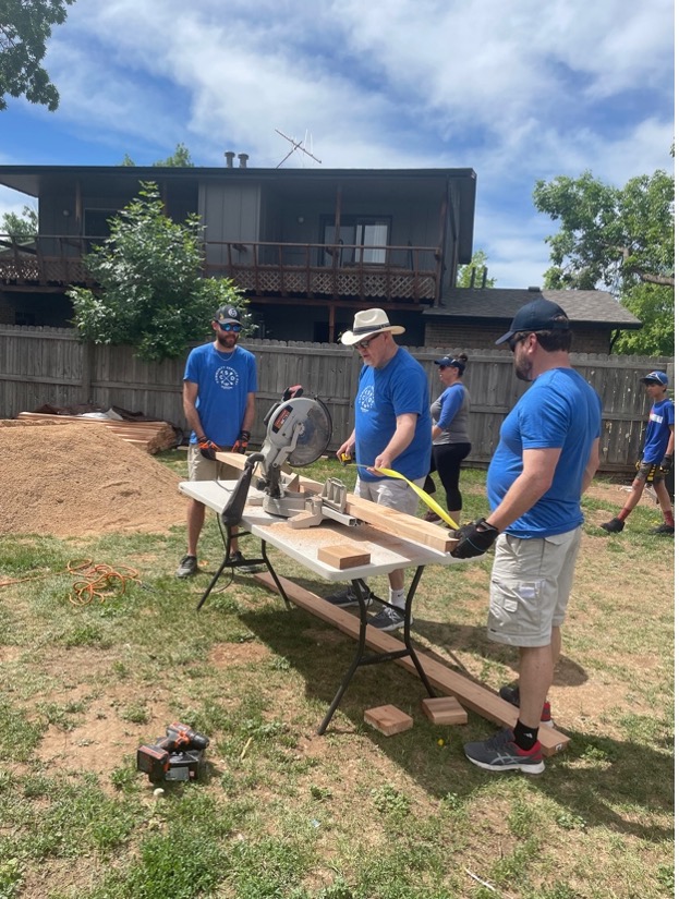 A group of agents and staff from Windermere Northern Colorado working on a project during Community Service Day 2022.