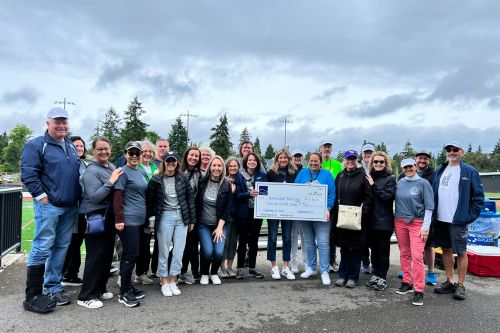 A group of real estate agents from the Windermere Mercer Island office volunteering together on Community Service Day 2023.