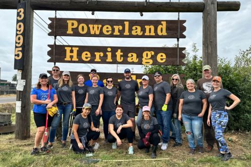 A group of real estate agents from the Windermere Heritage office in Oregon volunteering together on Community Service Day 2023.