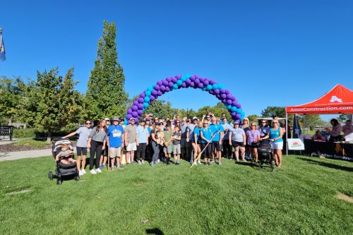 A group of staff from Windermere Utah at the Out of the Darkness Community Walk to Benefit the American Foundation for Suicide Prevention.